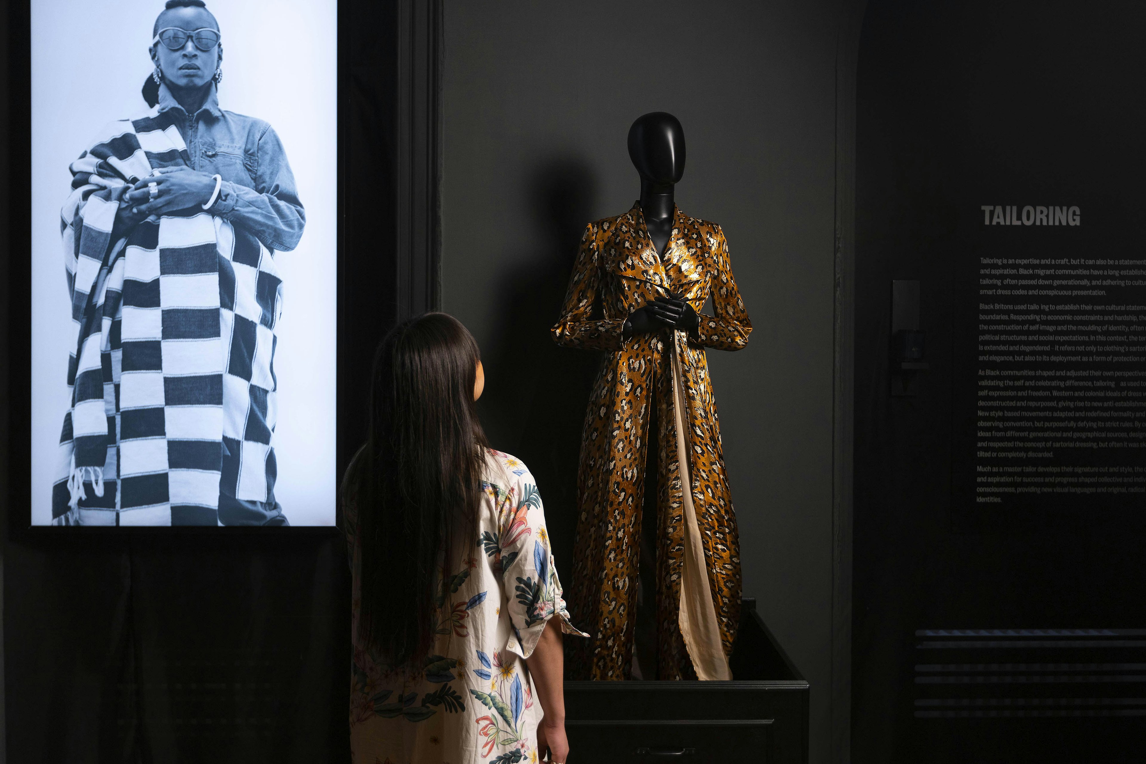 Erica Davletov views a piece by Ninivah Khomo ahead of the opening of ‘The Morgan Stanley Exhibition - The Missing Thread: Untold Stories of Black British Fashion’ at Somerset House, London