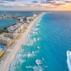 Cancun coast with sun; Shutterstock ID 1063645616; full: 65050; gl: Online Editorial; netsuite: Cancun neighborhoods article; your: Bailey Freeman
1063645616