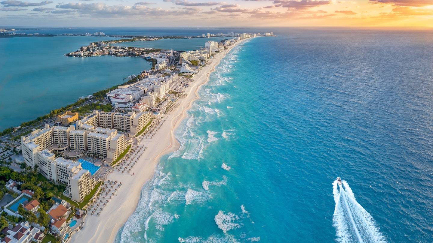 Cancun coast with sun; Shutterstock ID 1063645616; full: 65050; gl: Online Editorial; netsuite: Cancun neighborhoods article; your: Bailey Freeman
1063645616