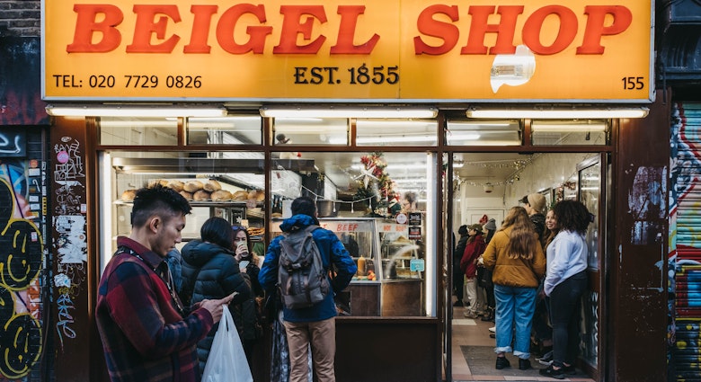 London, UK - December 29, 2019: Facade of Beigel Shop in Brick Lane, people walk in front, morion blur. The shop first opened in 1855 and sells fresh bagels 24 hours a day.; Shutterstock ID 1609429639; full: -; gl: -; netsuite: -; your: -
1609429639