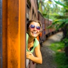 Young woman traveling by train in Sri Lanka; Shutterstock ID 250535167; full: 65050; gl: Online Editorial; netsuite: Sri Lanka Visa Requirements; your: Bailey Freeman
250535167