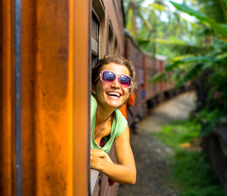 Young woman traveling by train in Sri Lanka; Shutterstock ID 250535167; full: 65050; gl: Online Editorial; netsuite: Sri Lanka Visa Requirements; your: Bailey Freeman
250535167