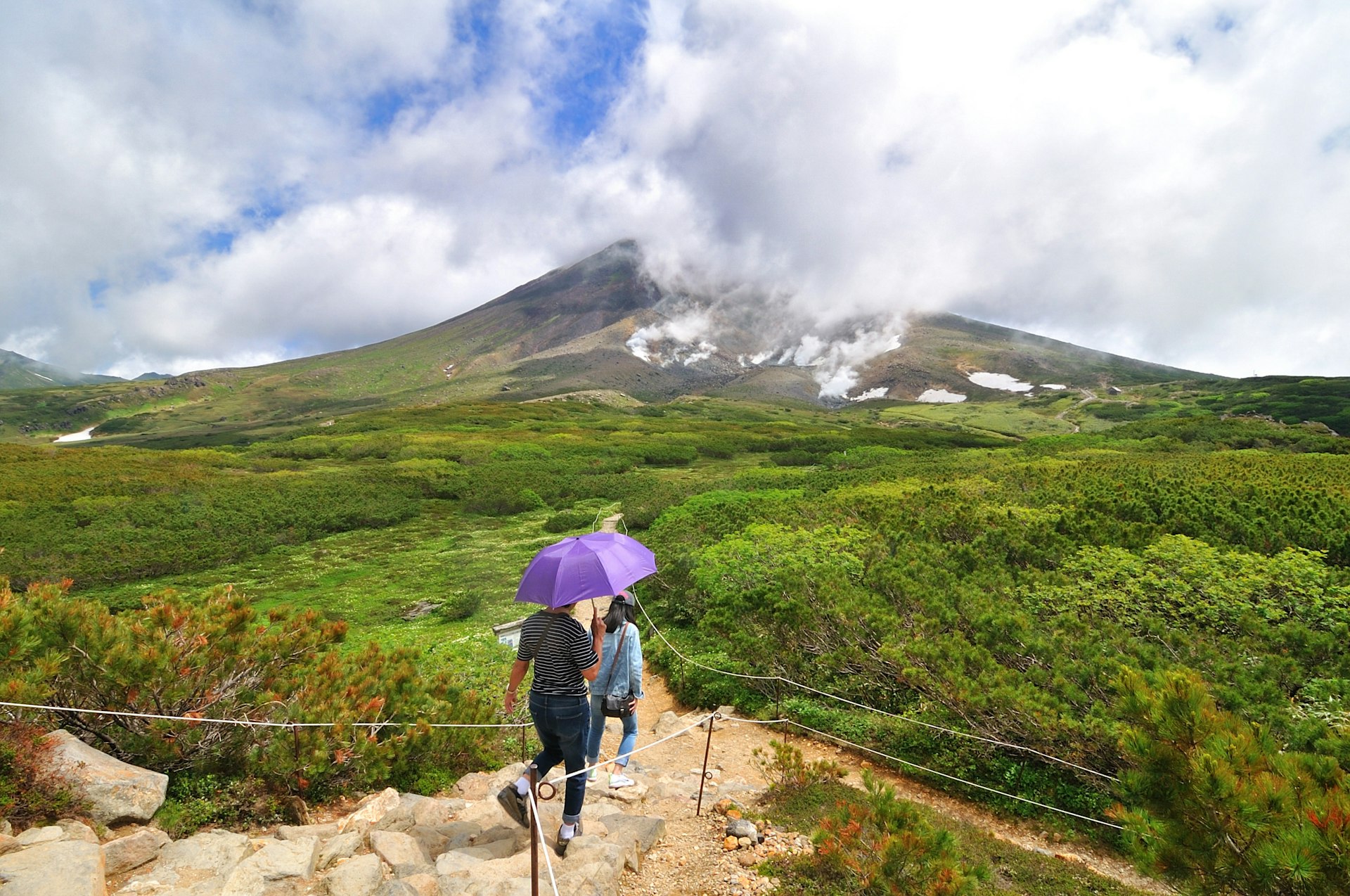 Hikers on the trail around the ropeway's upper station at Asahi-dake Mountain (Mt. Asahidake)