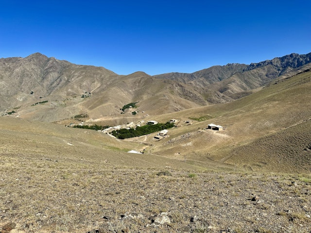 A small village inside the mountains and rolling landscape of the Nurata desert.