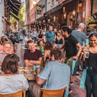 Melbourne, Victoria, Australia, January 25, 2020: Hardware Lane in Melbourne, Australia is a popular tourist area filled with cafes and restaurants featuring al fresco dining.
1206150505
People drinking and eating along Hardware Lane in Melbourne, Australia