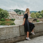 A beautiful woman with blond hair walks through the streets of the city. Girl enjoy holidays in Europe. Beautiful historical architecture. Italian weekend. Travel to Turin, Italy. Adventure lifestyle
1214448541