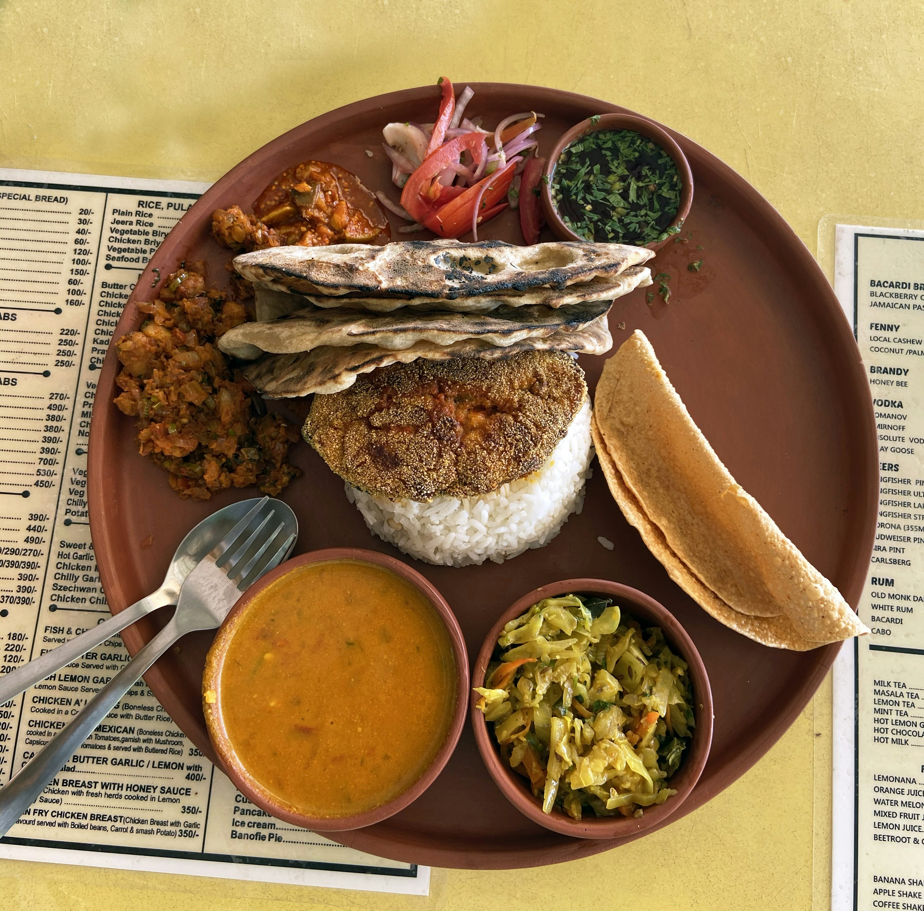 Goan fish thali in a beachside restaurant at Palolem Beach, Goa, India