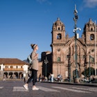 Happy female tourist walking around Cusco in front of the Cathedral - travel destinations concepts
1324227699
Tourist walking around Cusco in front of the Cathedral - stock photo
Happy female tourist walking around Cusco in front of the Cathedral - travel destinations concepts