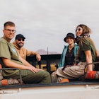 A group of friends sitting in the back of a 4x4 truck in Jordan
