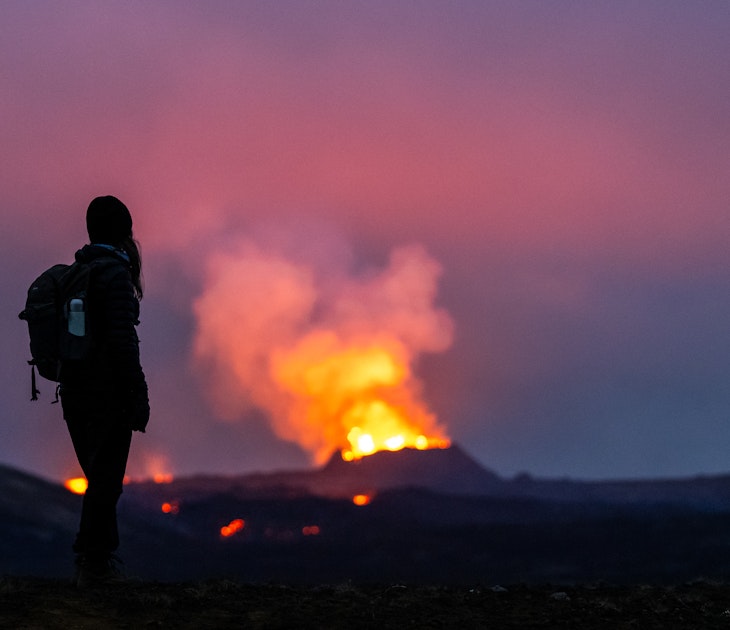 dpatop - 21 July 2023, Iceland, Fagradalsfjall: Lava erupts from the crater of a volcano near the mountain Litli-Hrútur, about 40 kilometers southwest of Reykjavik. A young woman stands in the foreground, gazing at the flames. Iceland has seen a volcanic eruption for the third year in a row. Photo: Philipp Schulze/dpa (Photo by Philipp Schulze/picture alliance via Getty Images)
dpatop - 21 July 2023, Iceland, Fagradalsfjall: Lava erupts from the crater of a volcano near the mountain Litli-Hrútur, about 40 kilometers southwest of Reykjavik. A young woman stands in the foreground, gazing at the flames. Iceland has seen a volcanic eruption for the third year in a row. Photo: Philipp Schulze/dpa (Photo by Philipp Schulze/picture alliance via Getty Images)
1546721678
volcanoes, free time, observer, smartphone, smoke