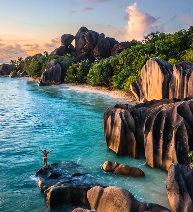 Woman enjoying sunset at Anse Source d'Argent, aerial view, La Digue Island, Seychelles
1554675838
Woman enjoying sunset at Anse Source d'Argent, Seychelles - stock photo
Woman enjoying sunset at Anse Source d'Argent, aerial view, La Digue Island, Seychelles