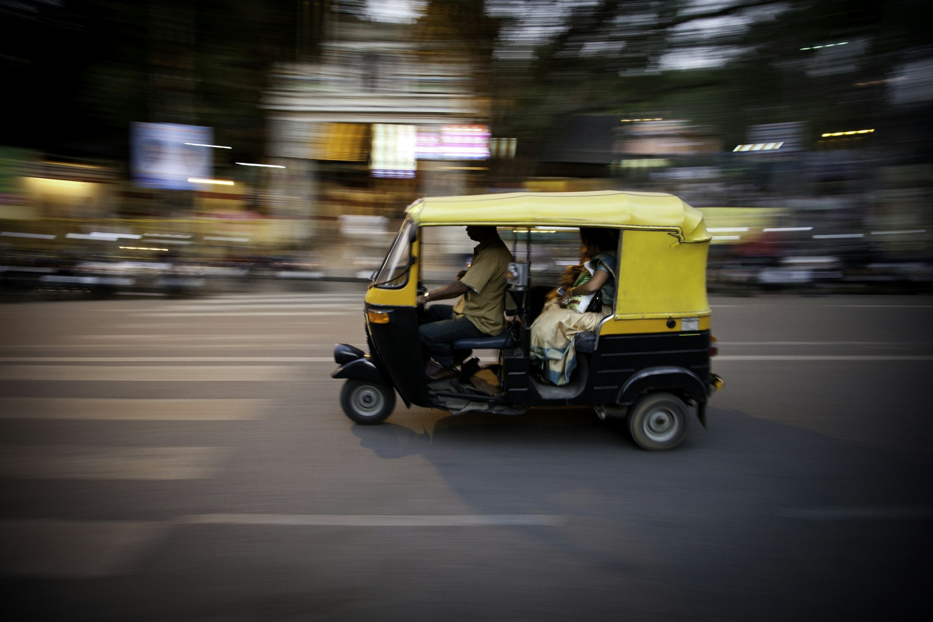 Autorickshaw at high speed on highway in India