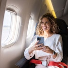 Latin American female traveler using her cell phone in an airplane and looking through the window
1691534153
entertainment
Female traveler using her cell phone in an airplane - stock photo
Latin American female traveler using her cell phone in an airplane and looking through the window