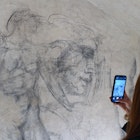 FLORENCE, ITALY - OCTOBER 31: A visitor photographs charcoal drawings inside "Michelangelo's Secret Room" at the Medici Chapel Museum on October 31, 2023 in Florence, Italy. The secret room, a 33-by-10 foot space containing charcoal drawings attributed by some experts to Michelangelo, was discovered in 1975, when officials were searching for a new exit from the Medici Chapel to accommodate increasing visitors. (Photo by Roberto Serra - Iguana Press/Getty Images)
1766927241