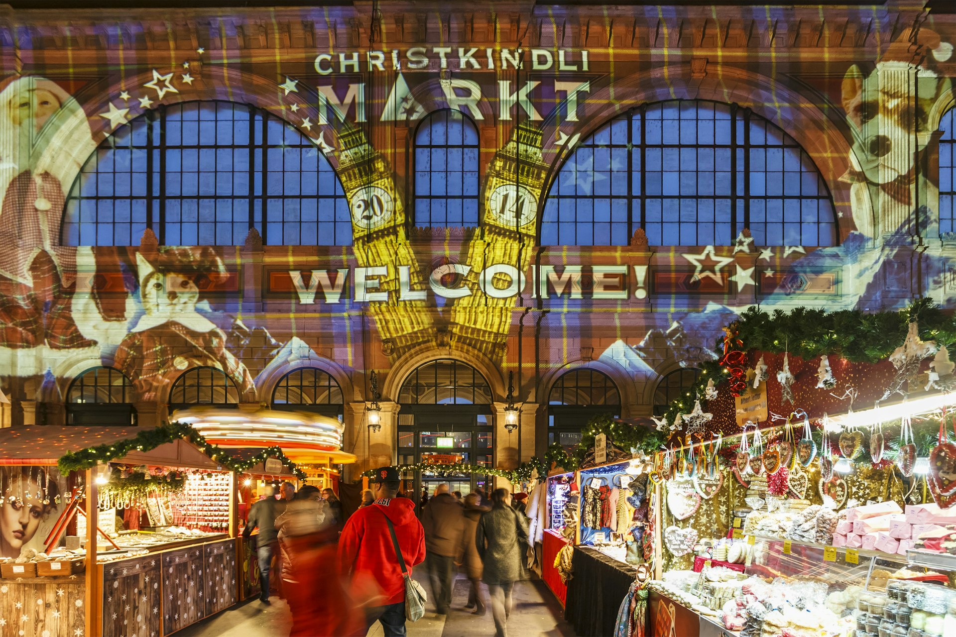 The Christmas market in the Central Station in Zurich hosts the largest indoor Christmas market in Europe with a large Christmas tree sparkling with over 7000 Swarovski crystals