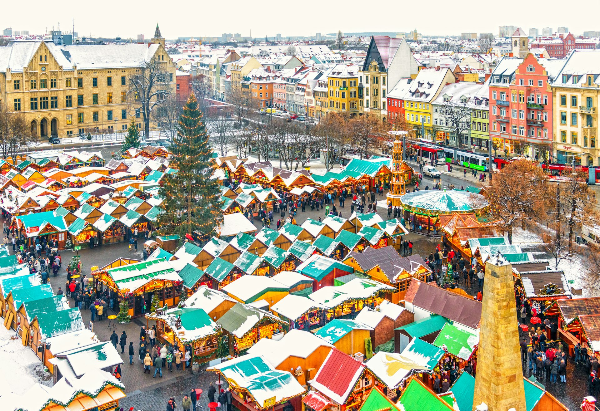 Elevated view over the historic city center of Erfurt and its famous Christmas market on a snowy late December afternoon