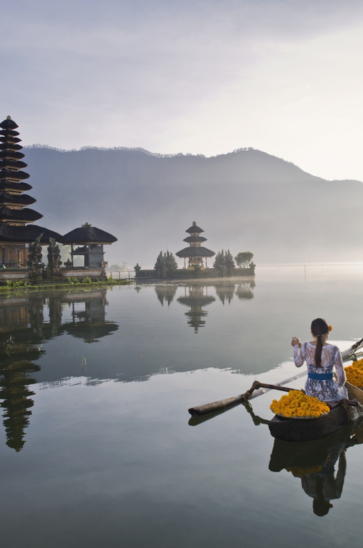 Indonesia, Bali, woman wearing traditional clothing, rowing a wooden boat full with flowers, infront of Ulun Danu Bratan temple
583896554
tradition:CB2, traveling:CB2, hinduism:CB2, one person:CB2, agriculture:CB2, cut flowers:CB2, traditional clothing:CB2, working:CB2, young adult woman:CB2, portrait:CB2, pastoral:CB2, quiet:CB2, watercraft:CB2, idyllic:CB2, old-fashioned:CB2, away from it all:CB2, beauty:CB2, vacation:CB2, landmark:CB2, oar:CB2, architecture:CB2, back view:CB2, daytime:CB2, graceful:CB2, 20-24 years:CB2, countryside:CB2, outdoors:CB2, serenity:CB2, simplicity:CB2, transportation:CB2, reflection:CB2, Balinese:CB2, building:CB2, loading:CB2, rural scene:CB2, exotic:CB2, mountain:CB2, temple:CB2, lake:CB2, hindu:CB2, scenic:CB2, Bali:CB2, building exterior:CB2, travel & tourism:CB2