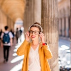 Portrait of a young female student dressed casually in the famous arched galleries in Bologna city in Italy. Bologna is student city and home to the oldest university in the world
590618026
Beautiful, Coffee Break, Student, Arcade, Girls, Teenage Girls, Women, Females, Pedestrian Walkway, Colonnade, Bologna, Cute, Music, Headphones, Art Museum, Young Adult, Adult, Listening, Fun, Caucasian Ethnicity, Arch, One Person, History, Enjoyment, Yellow, Old, Italian Culture, Education, Architecture, Urban Scene, Cheerful, People, Italy, Europe, Architectural Column, Corridor, Campus, University, Footpath, City, Eyeglasses, Sweater, Casual Clothing, Classic