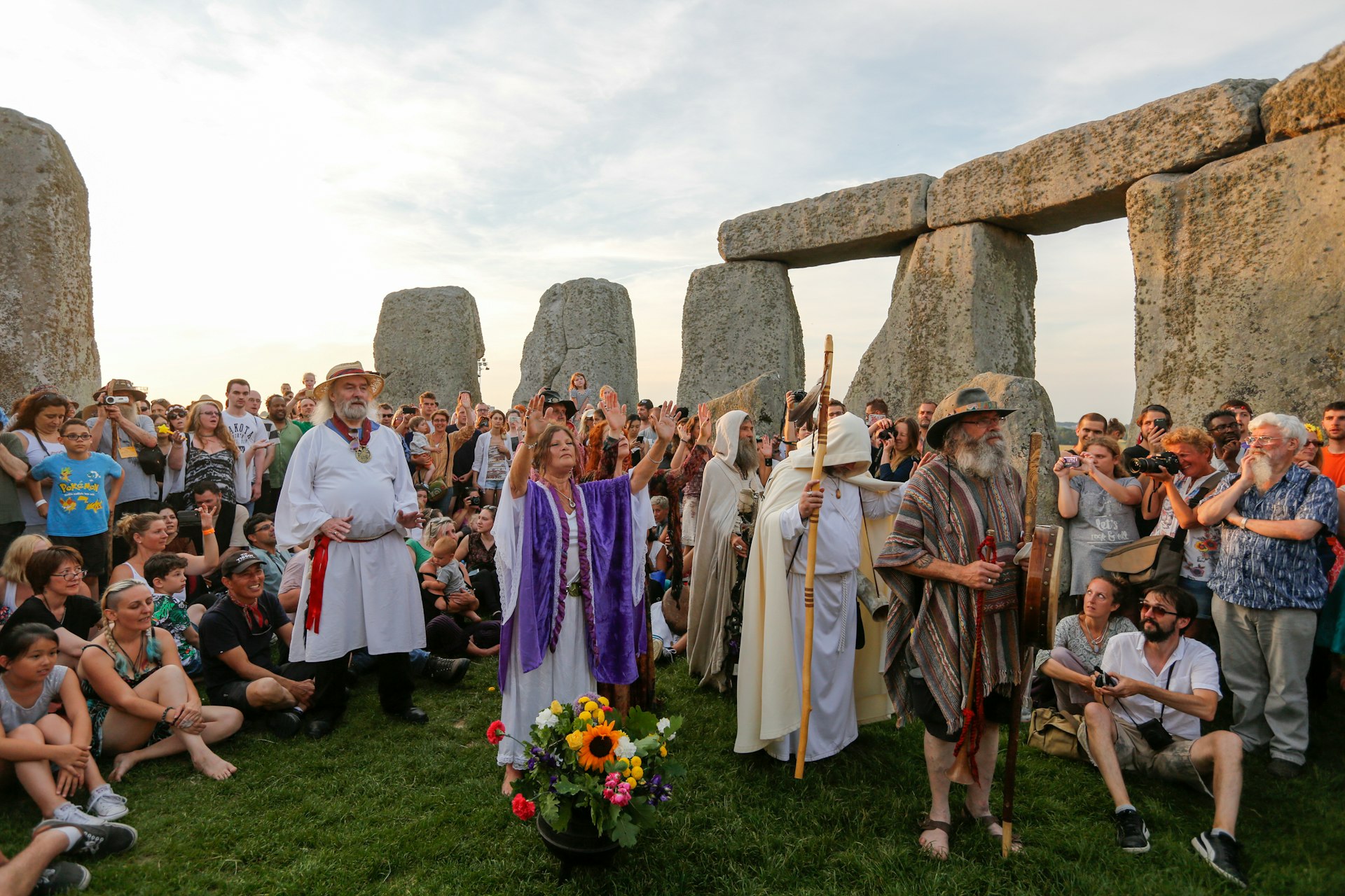Revelers gather for the summer solstice at Stonehenge, Wiltshire, England, United Kingdom