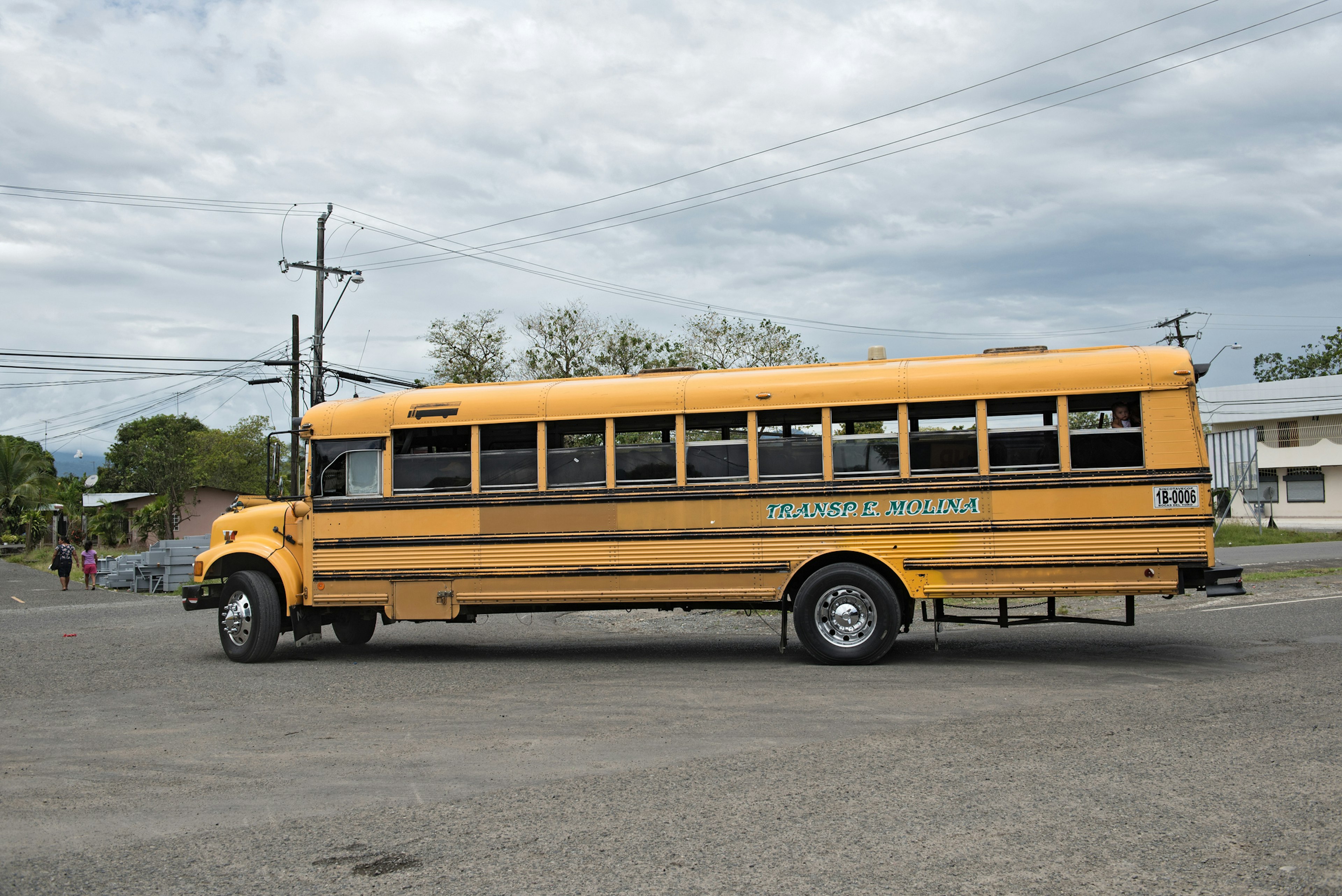 Yellow city bus in Guabito (Panama) on the border to Costa Rica