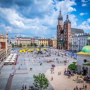 Main Square (Rynek Glowny) with the marketplace (Sukiennice), Adam Mickiewicz Monument (pomnik Adama Mickiewicza), church of Saint Mary (Kosciol Mariacki) and church of Saint Adalbert (Kosciol sw. Wojciecha).
1000993660
City, Sunny, Buiding, Tourism, Market Square, Saint Adalbert, History, St Mary, Old Town, Cathedral, No People, Market - Retail Space, Cityscape, Architecture, Adam Mickiewicz Monument, Outdoors, Travel, Basilica, Marys, Church, Clear Sky, Photography, Poland, Cloth Hall, Capital - Architectural Feature, Rynek Glowny Square, Horizontal, Polish, Krakow, POLSKA, Town Square