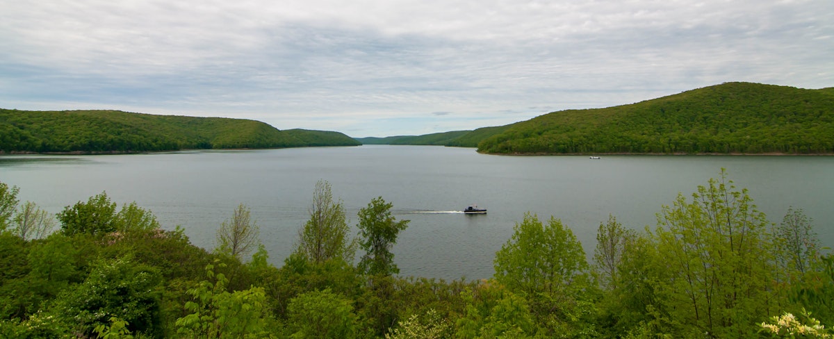 The Allegheny Reservoir in Warren County, Pennsylvania, USA behind Kinzua Dam on a spring day with a houseboat on the water
1152322706
warren, warren county, outdoor, landscape, green, beautiful, allegheny, kinzua, trail, america, scenic, view, county, mountains, states, appalachian, hills, vacation, scenery, destination, country, woods, countryside, northwestern, allegheny reservoir, spring day, overlook, house boat, recreation