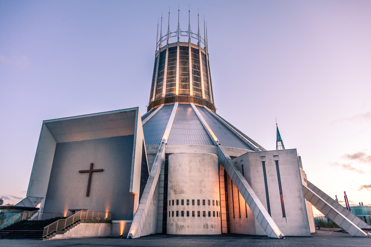 Liverpool, United Kingdom - November 05, 2017: Front view of the Roman Catholic Cathedral with stained glass panels at the base of the steps in the foreground, Liverpool, Merseyside, England, UK, Western Europe.
872038376