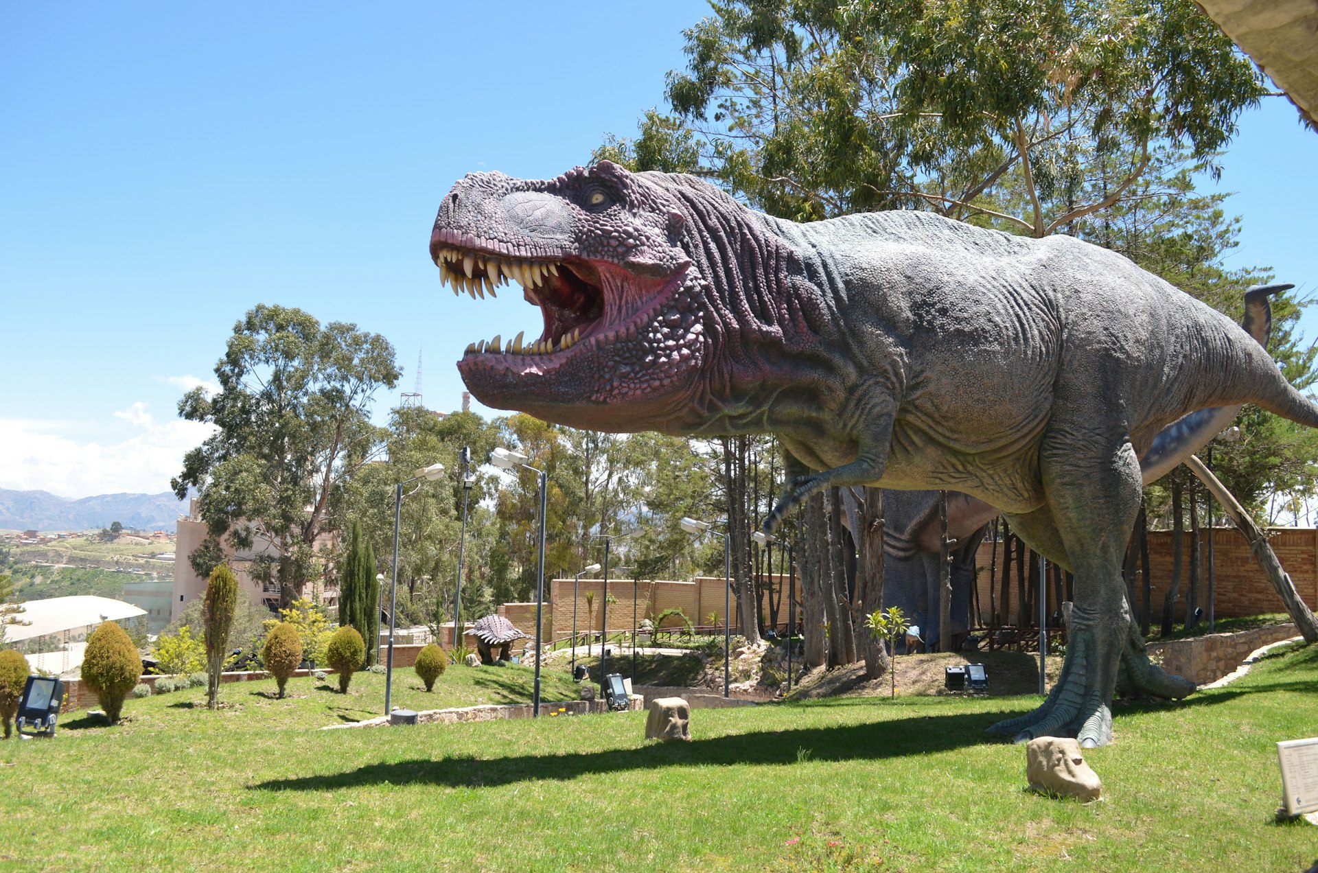 A huge dinosaur model roaring