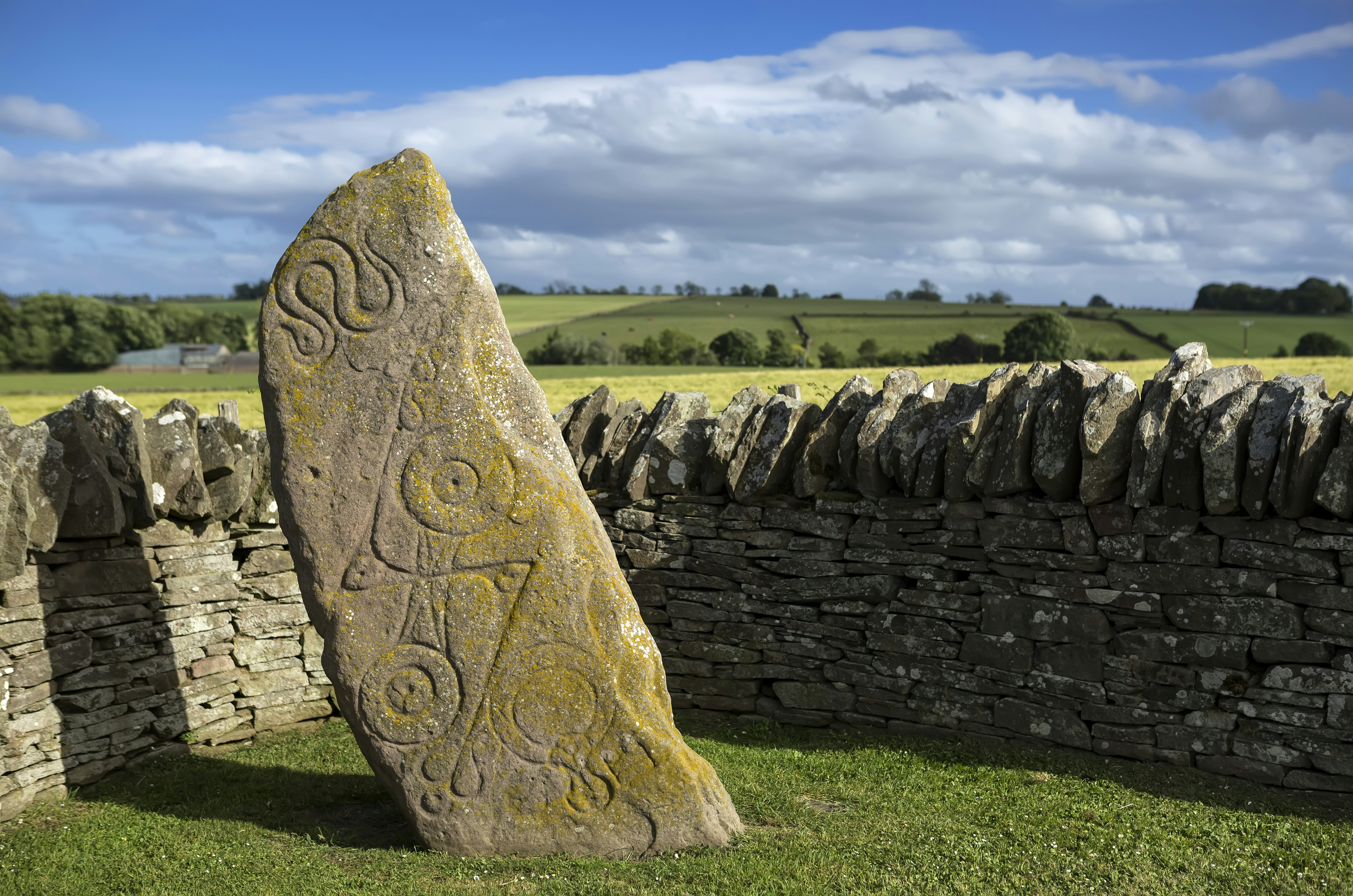 Aberlemno Pictish Stone in Scotland
1124293226
aberlemno, ancient, angus, archeology, art, britain, british, building, carved, celtic, church, culture, design, detail, exterior, heritage, historic, history, incised, landmark, landscape, medieval, monument, mystic, old, outdoor, pattern, pict, pictish, pictish stone, religion, roadside cross, rock, ruin, sandstone, scotland, scottish, sculpture, sky, standing, statue, stone, surface, symbol, texture, tourism, traditional, travel, uk, weathered