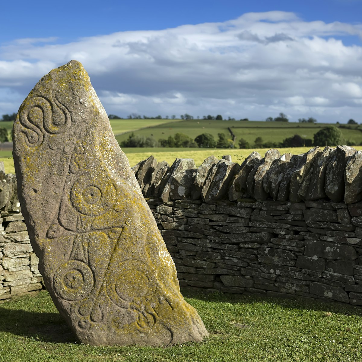 Aberlemno Pictish Stone in Scotland
1124293226
aberlemno, ancient, angus, archeology, art, britain, british, building, carved, celtic, church, culture, design, detail, exterior, heritage, historic, history, incised, landmark, landscape, medieval, monument, mystic, old, outdoor, pattern, pict, pictish, pictish stone, religion, roadside cross, rock, ruin, sandstone, scotland, scottish, sculpture, sky, standing, statue, stone, surface, symbol, texture, tourism, traditional, travel, uk, weathered