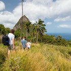 Family of father and kids hiking on summer day at tropical island of St Lucia in Caribbean with amazing views to iconic Pitons mountain; Shutterstock ID 1160509876; full: 65050; gl: Online ed; netsuite: Things to do St Lucia; your: Claire N
1160509876