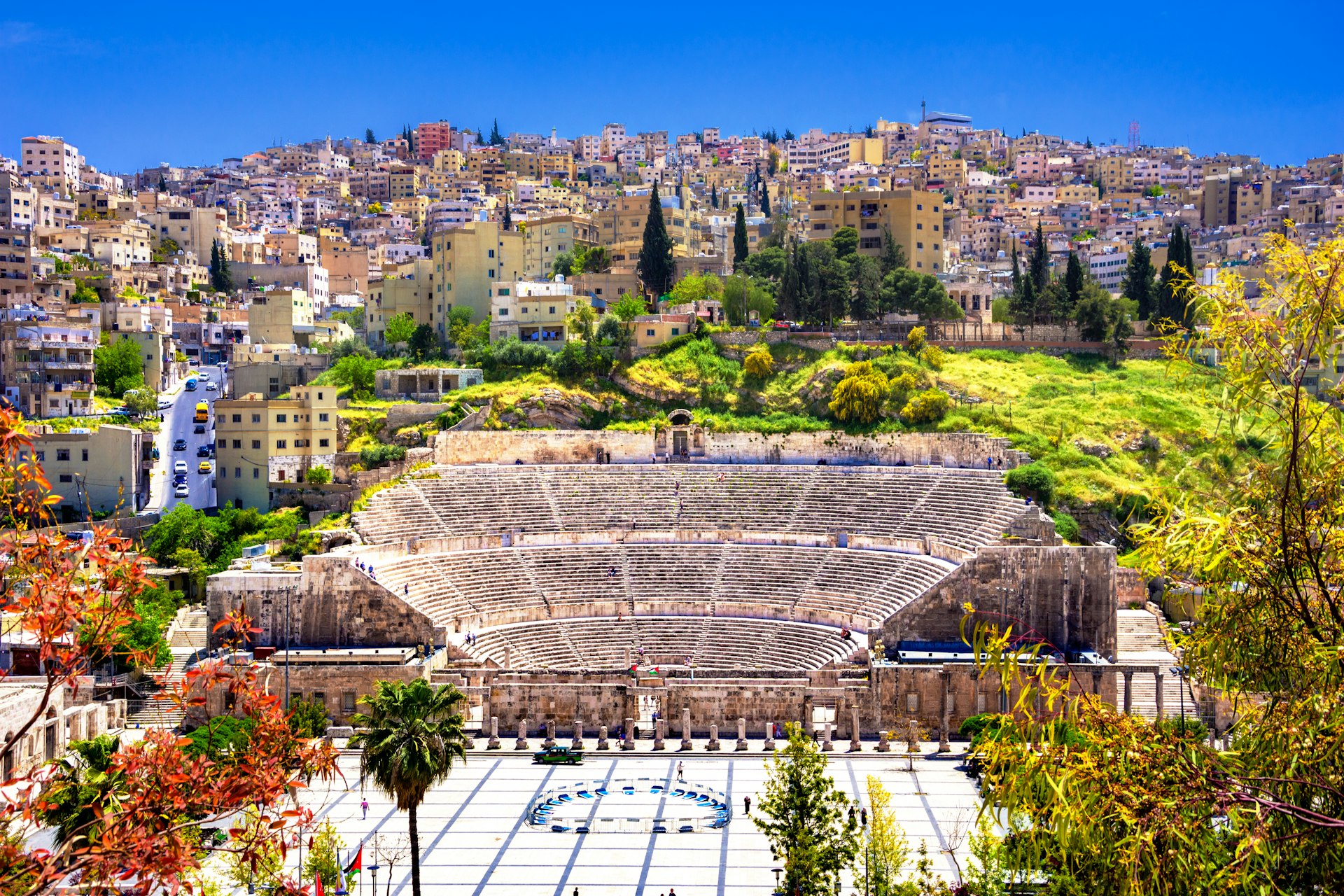 An aerial view of the Roman amphitheater carved into the hillside of Amman, Jordan