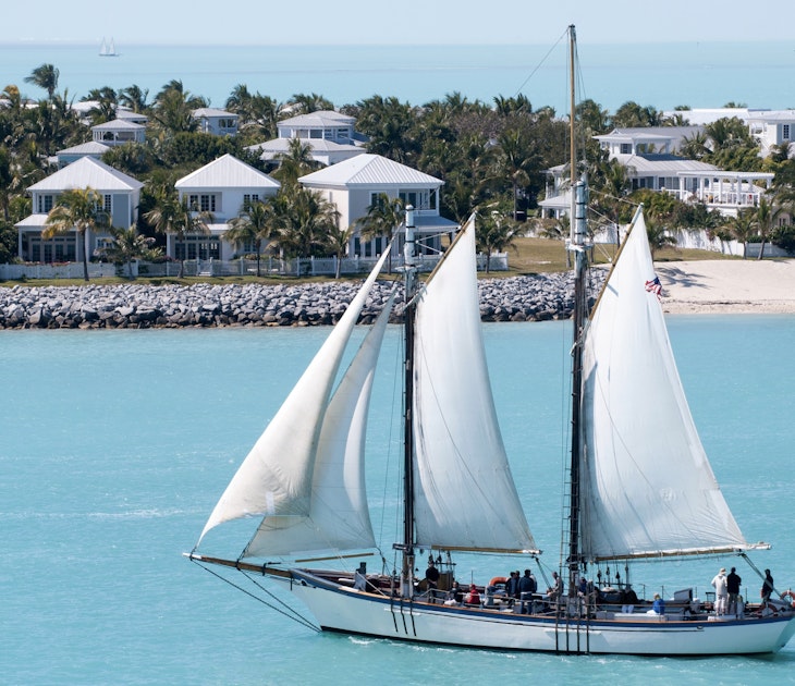 The sailing ship passing by the artificial residential island Sunset Key in Key West town (Florida).; Shutterstock ID 1587813181; full: 65050; gl: Lonely Planet Online Editorial; netsuite: 10 best warm-weather spots in USA; your: Brian Healy
1587813181
architecture, artificial, boat, caribbean, destination, florida, holiday, home, horizon, house, island, journey, key west, leisure activity, nature, nautical, places, residential, sail, sailboat, sea, ship, sky, south, suburb, tourism, transport, transportation, travel, tropical, united states, usa, vacation, vessel, voyage, water, yacht