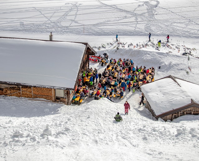 People relaxing in after-ski bar restaurant, Tirol, Austria