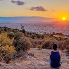 Tourist man watching the sunset over city of Athens seen from Filopappou Hill (hill of muses), Athens, Attica, Greece, Europe. Athens cityscape and Aegean sea. Beautiful sunset point with aerial view; Shutterstock ID 2322198929; full: 65050; gl: Online editorial; netsuite: Athens things to do; your: Claire Naylor
2322198929