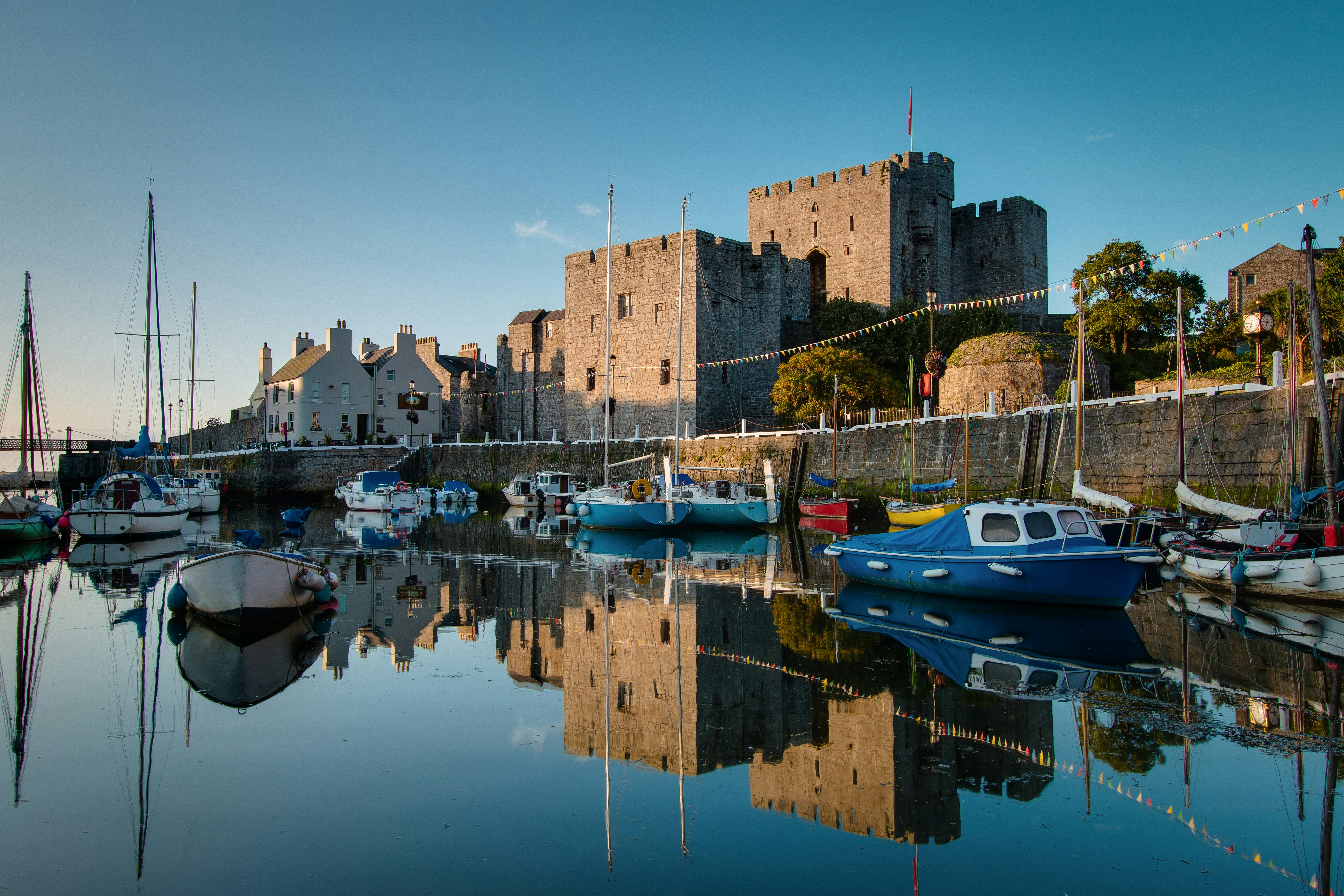Castle Rushen in Castletown in the Isle of Man, with reflections in the harbor - taken shortly after sunrise; Shutterstock ID 452503759; full: digital; gl: 65050; netsuite: poi; your: Barbara Di Castro
452503759