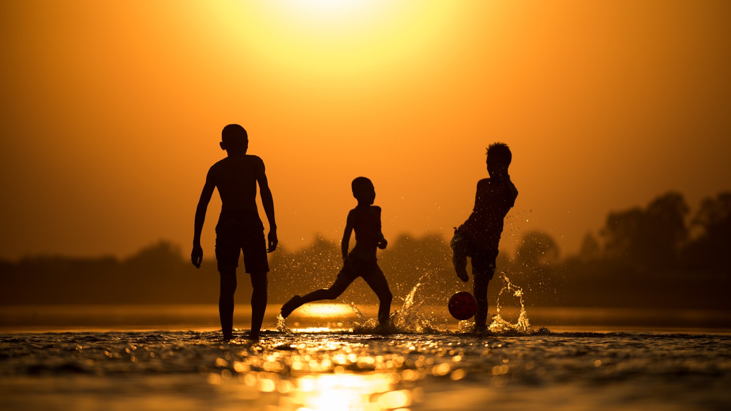 Silhouette of young boys playing during sunset ; Shutterstock ID 580738648; full: 65050; gl: Online Editorial; netsuite: Rio with kids; your: Bailey Freeman
580738648