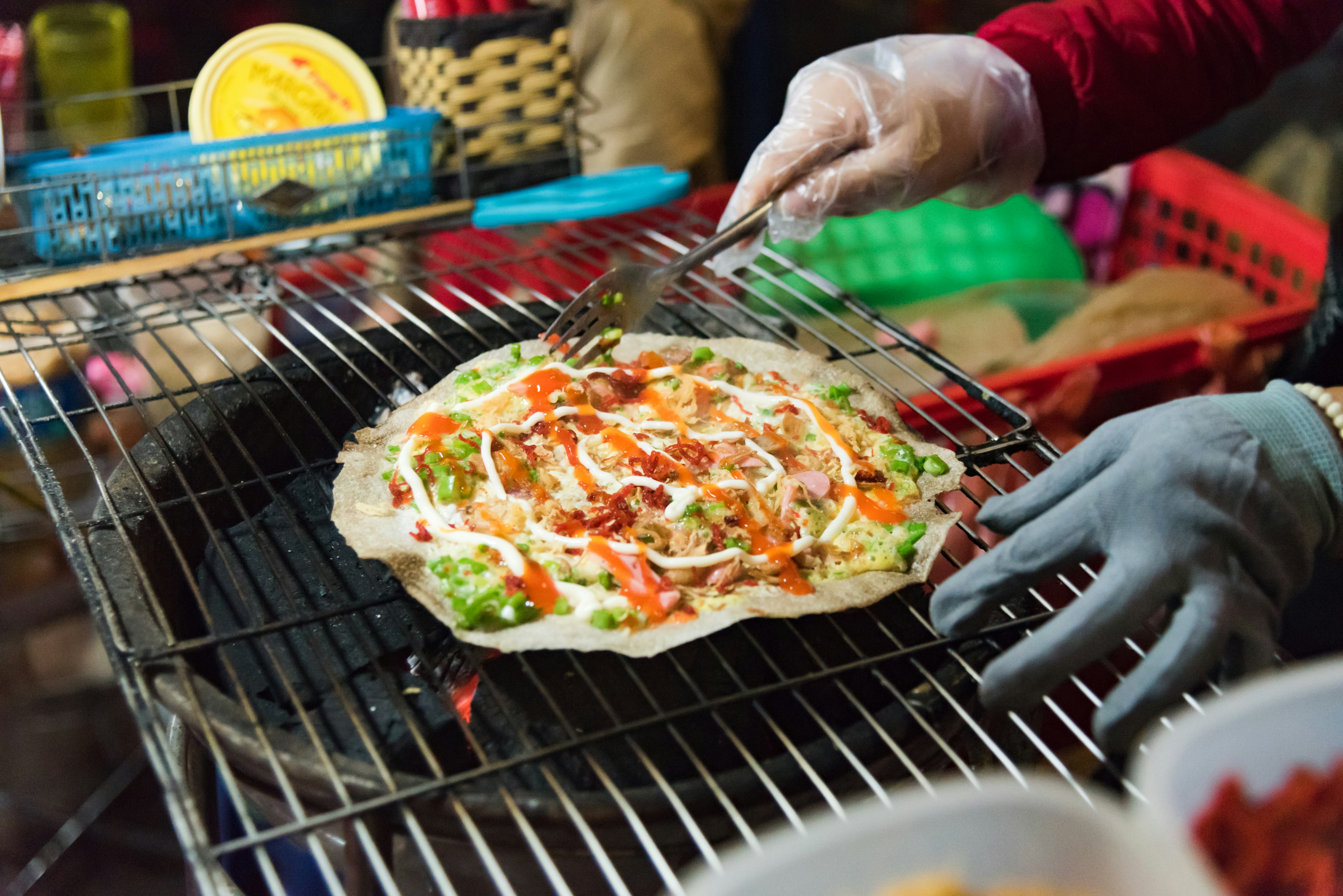 Street food at a night market in Ho Chi Minh City, Vietnam