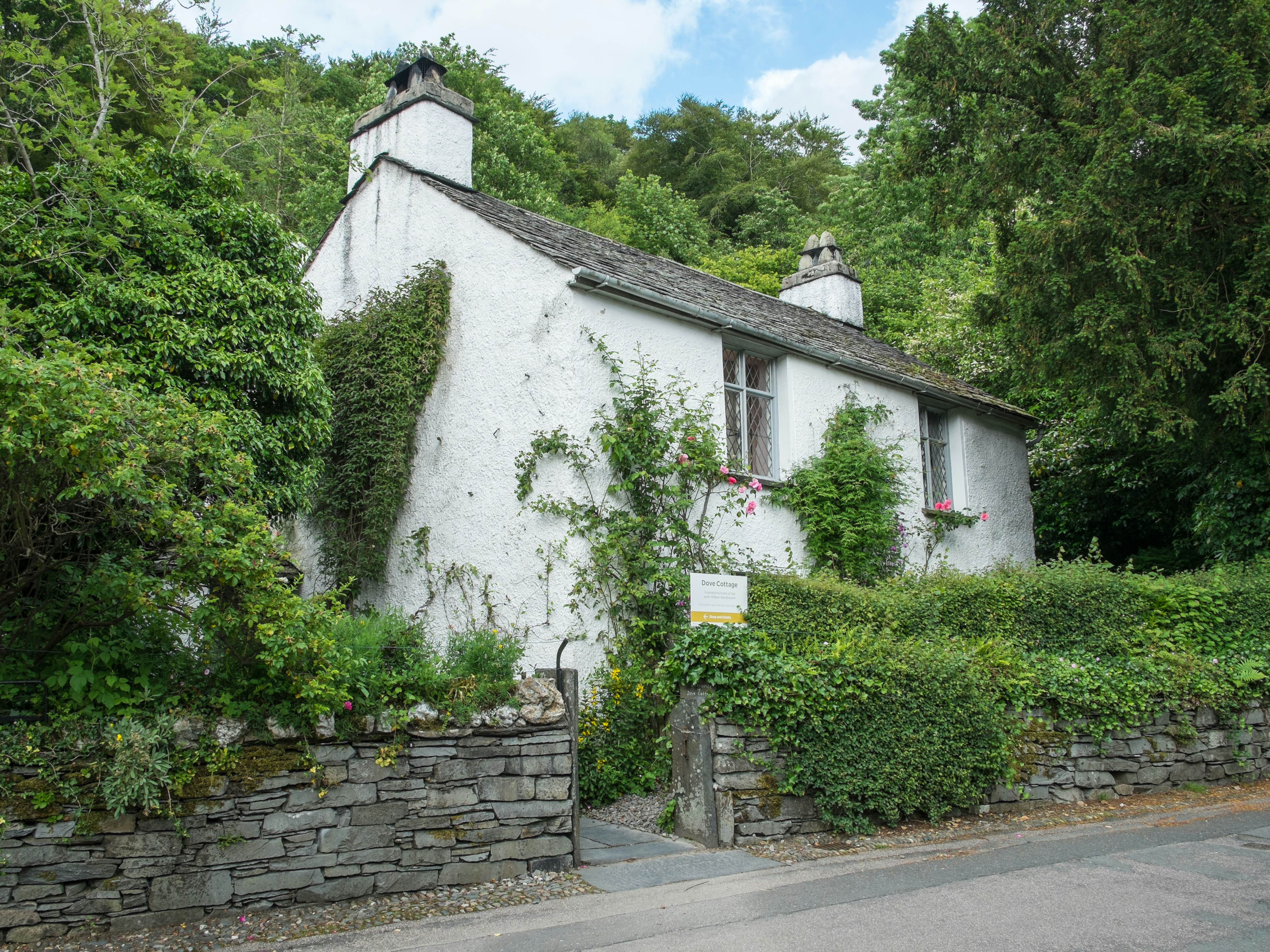 Grasmere, Lake District, UK - June 2017: Dove Cottage - picturesque home of the poet William Wordsworth.
690001708