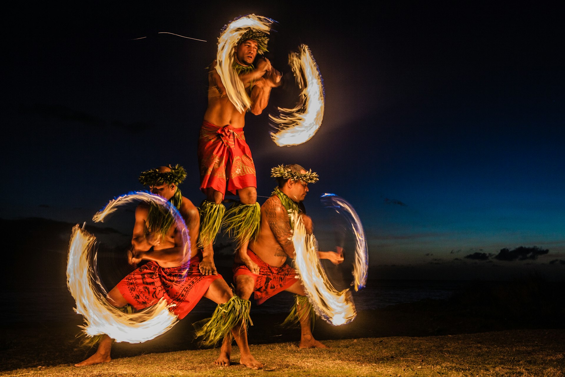 Three Strong Men Juggling Fire in Hawaii: Fire Dancers