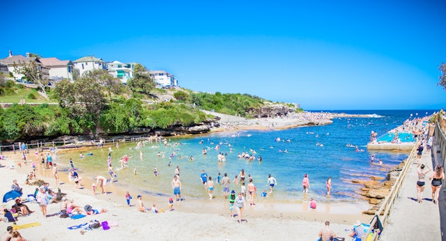 People relaxing at Clovelly sandy beach in Sydney