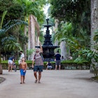 Rio de Janeiro, Brazil - May 3, 2015: Father and son looking up and talking about the immensely tall royal palm trees in the botanical garden of Rio de Janeiro; Shutterstock ID 1164884020; full: 65050; gl: Online Editorial; netsuite: Rio with kids; your: Bailey Freeman
1164884020