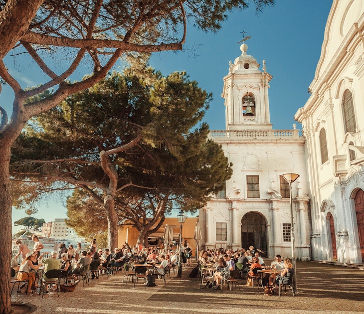 Lisbon, Portugal: Crowd of visitors of outdoor restaurant drinking and relaxing on terrace with beautiful city view on May 14, 2019. Alfama is the oldest district of Lisbon city
LISBON, PORTUGAL: Crowd of visitors of outdoor restaurant drinking and relaxing on terrace with beautiful city view on May 14, 2019. Alfama is the oldest district of Lisbon city
1165713145
terrace, beverage, group, happy, bar, food and wine, vacation, park, beer, holiday, outdoor, weekend, friends, meet, view, green, evening, slow food