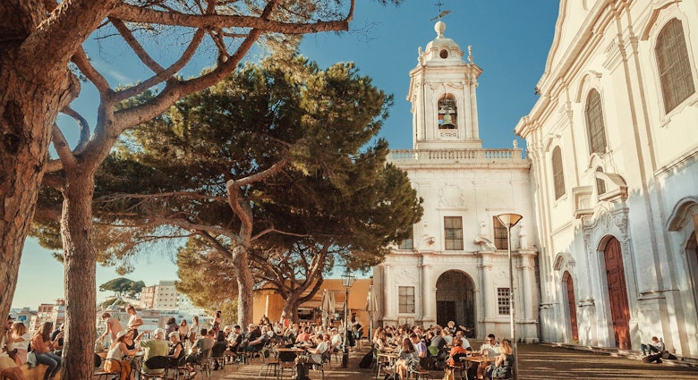 Lisbon, Portugal: Crowd of visitors of outdoor restaurant drinking and relaxing on terrace with beautiful city view on May 14, 2019. Alfama is the oldest district of Lisbon city
LISBON, PORTUGAL: Crowd of visitors of outdoor restaurant drinking and relaxing on terrace with beautiful city view on May 14, 2019. Alfama is the oldest district of Lisbon city
1165713145
terrace, beverage, group, happy, bar, food and wine, vacation, park, beer, holiday, outdoor, weekend, friends, meet, view, green, evening, slow food