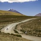 An off-road car driving through the altiplanos and mountains, Bolivia - stock photo
An off-road car driving through the altiplanos and mountains, Bolivia