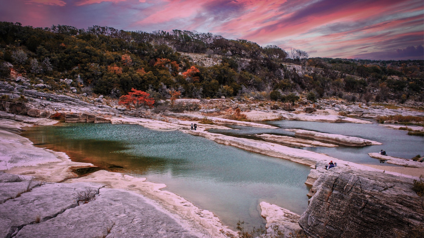 Peranales River that sometimes flows underground near LBJ Ranch in Teaas under crazy sunset sky with fall foliage
Peranales River that sometimes flows underground near LBJ Ranch in Teaas under crazy sunset sky with fall foliage and tourists.
1341493490
day-trip, pedernales river, trail, hill country, pedernales, beautiful, sundown, stunning, trees, fall, trekking, stone, natural, background, view, park, rock, scenic, outdoor, landscape, fall colors, pedernales falls, scenery, hiking trail