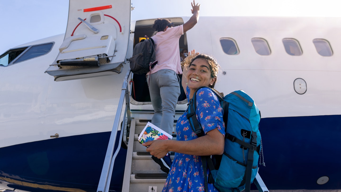 A shot of two young friends boarding a plane on the runway at the airport in Toulouse, France. One young woman is looking over her shoulder and smiling at the camera while carrying a backpack and boarding pass.
1477429815
Catching Flights - stock photo
A shot of two young friends boarding a plane on the runway at the airport in Toulouse, France. One young woman is looking over her shoulder and smiling at the camera while carrying a backpack and boarding pass.