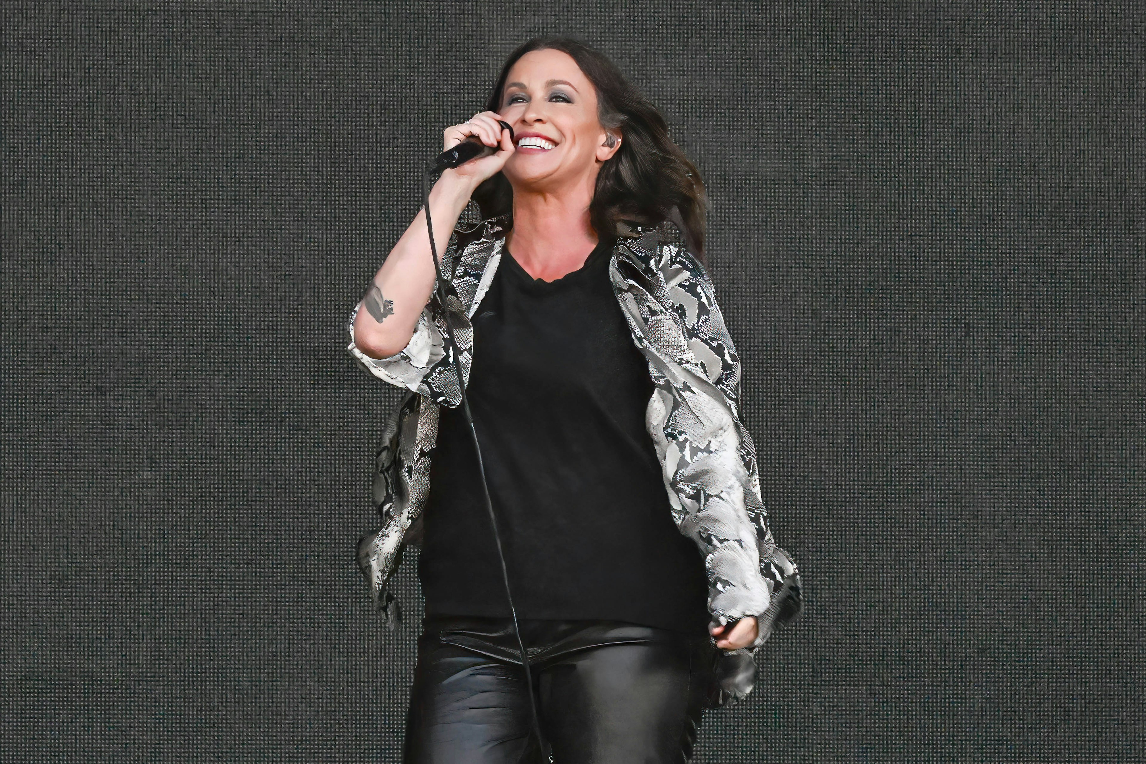 Alanis Morissette performs at a music festival