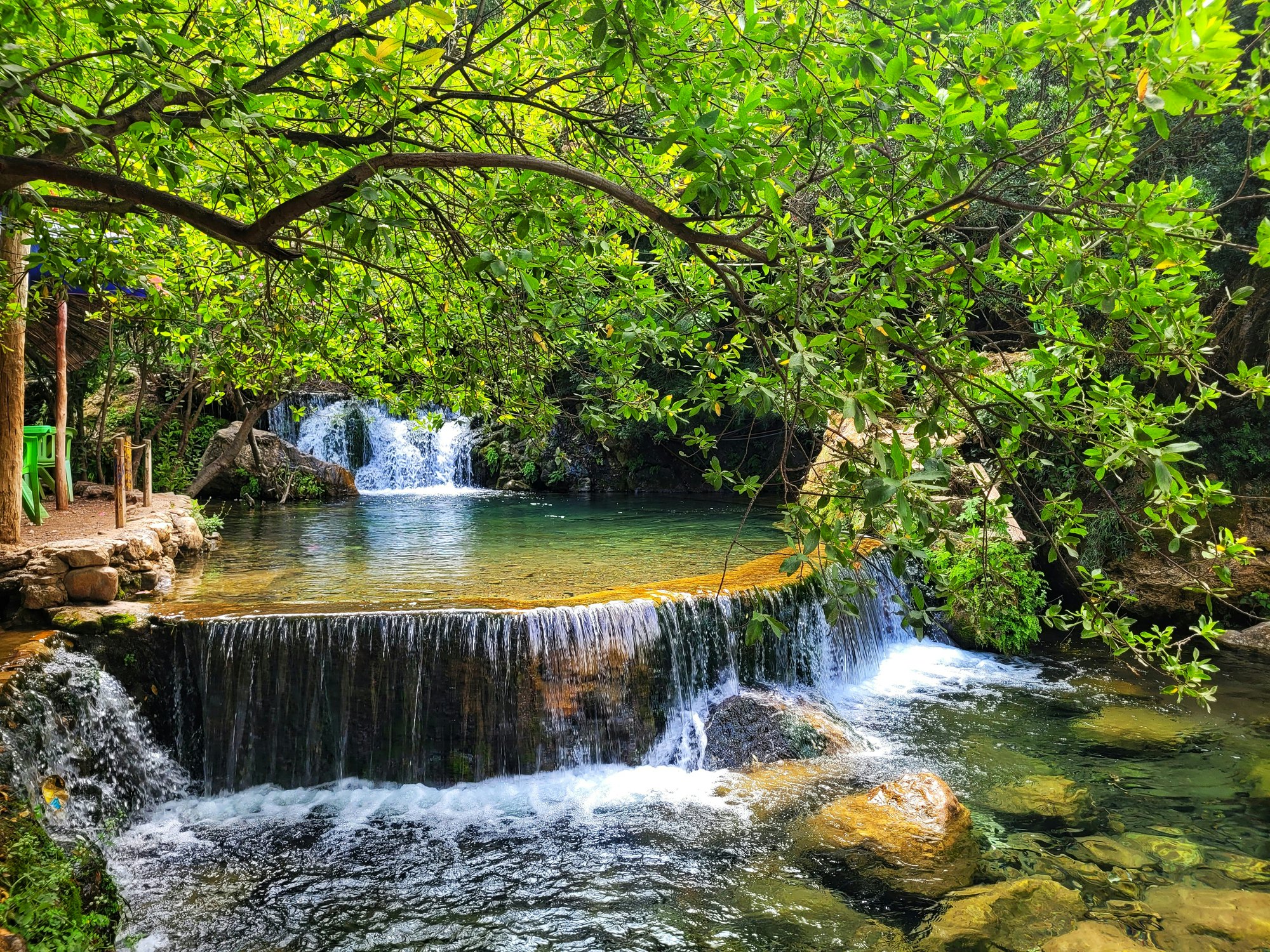 The most popular attraction at Akchour, the 100-metre-high grand cascade, is at the end of a two-hour hike through the Farda River in the Talambote Valley, Rif Mountains