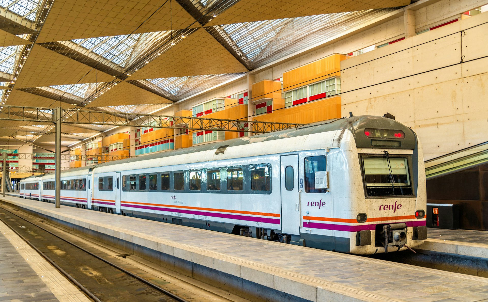 A Renfe Media Distancia train at Zaragoza-Delicias station in Zaragoza, Spain